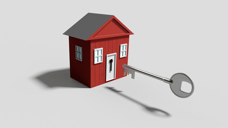 An illustration of a hovering key entering a small house.