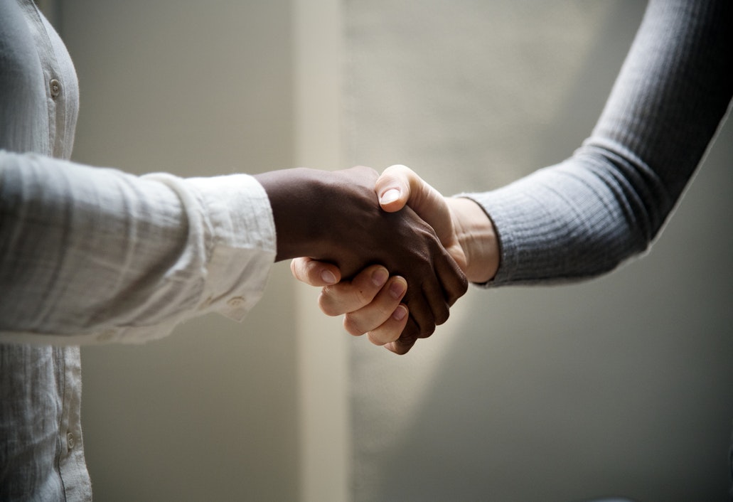 shaking hands customer trust