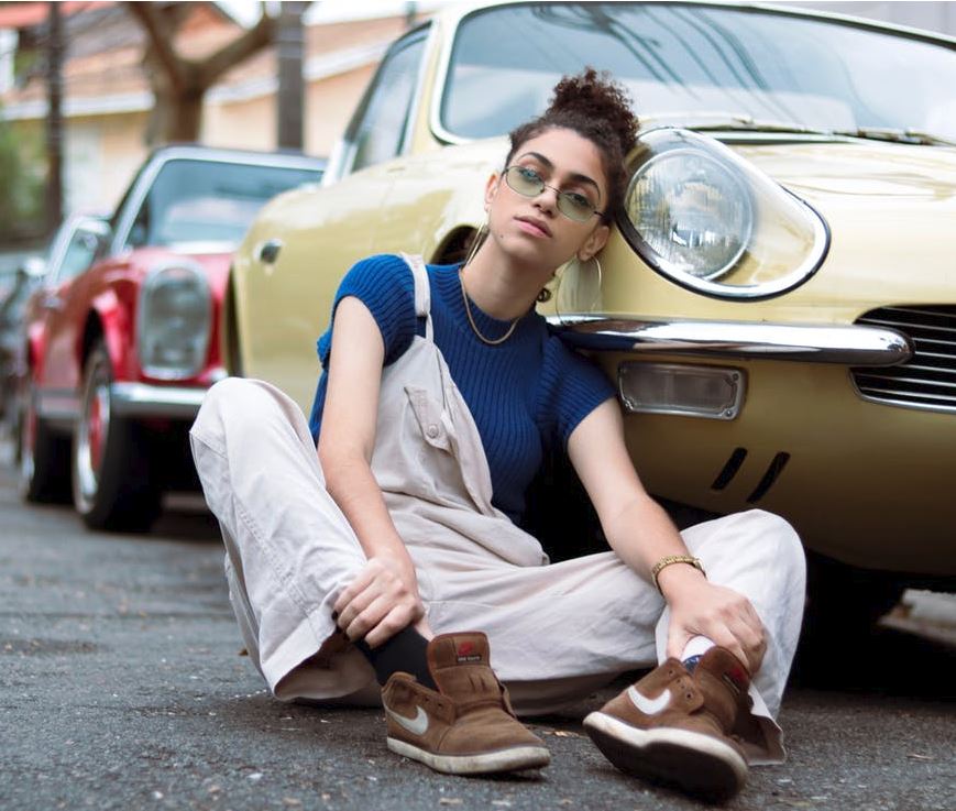 woman locked out of car sitting on floor